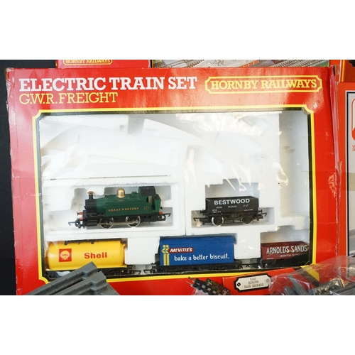 125 - Quantity of OO gauge model railway to include boxed Hornby R689 GWR Freight set (box containing loco... 