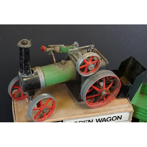 142A - Mamod TE1A Steam Tractor Engine with steering rod, plus a boxed Mamod OW1 Open Wagon (engine dusty &... 