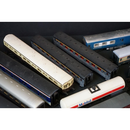 94 - Around 35 HO / OO gauge items of rolling stock, mainly coaches to include Triang, Lima, Dapol etc