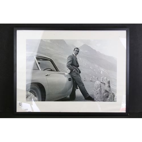 267 - James Bond - Collection of James Bond collectables to include ltd edn film cell presentations, photo... 