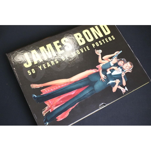 267 - James Bond - Collection of James Bond collectables to include ltd edn film cell presentations, photo... 