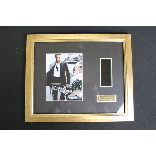 267 - James Bond - Collection of James Bond collectables to include ltd edn film cell presentations, photo... 