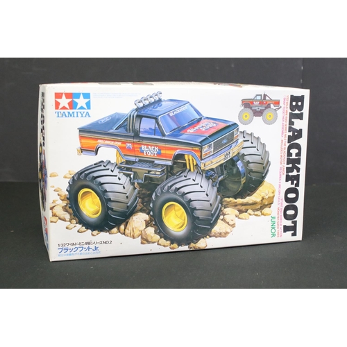 271 - Tamiya 1/10 scale R/C monster truck with Blackfoot chassis and Custom F150 black body, with battery ... 