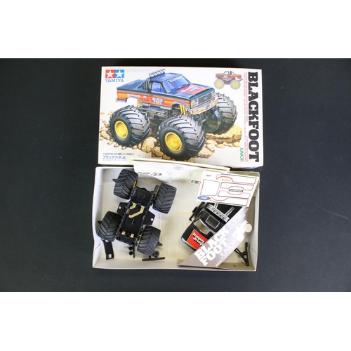 271 - Tamiya 1/10 scale R/C monster truck with Blackfoot chassis and Custom F150 black body, with battery ... 