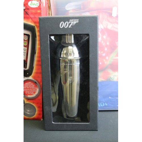 277 - James Bond - A large collection of James Bond collectables & games to include Spear's James Bond 007... 