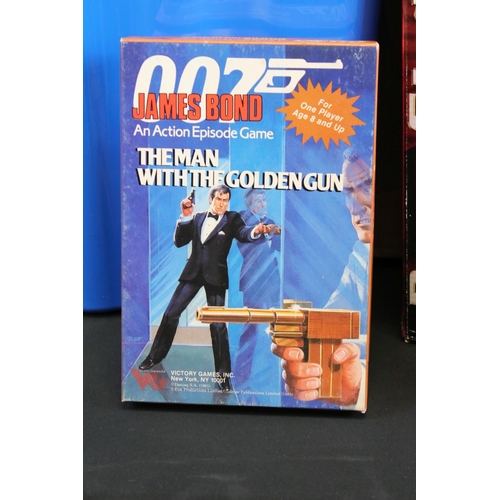 277 - James Bond - A large collection of James Bond collectables & games to include Spear's James Bond 007... 