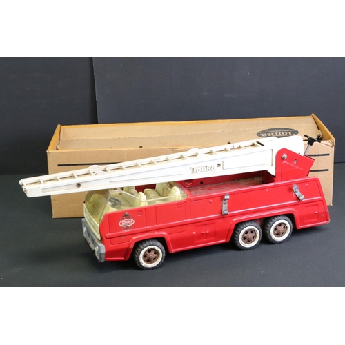 282 - Boxed Tonka 2960 tinplate Aerial Ladder Fire Engine (play worn, storage wear to box), plus a boxed C... 