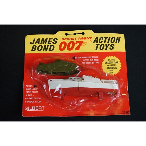 221 - James Bond - 13 Carded Gilbert James Bond 007 Secret Agent 1960's plastic figures & models to includ... 