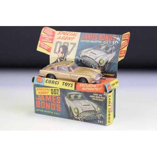 1410 - Boxed Corgi 261 James Bond Aston Martin DB5 diecast model with 2 x ejector figures and secret instru... 