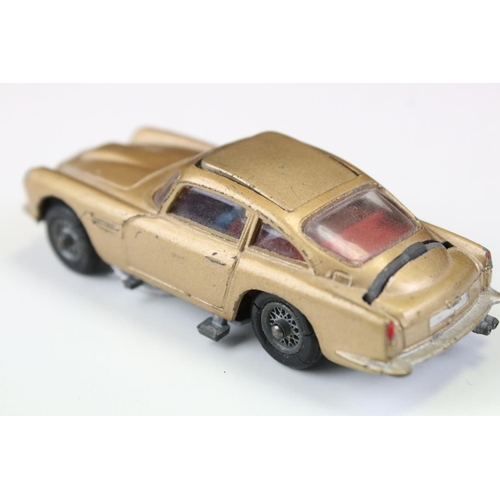 1410 - Boxed Corgi 261 James Bond Aston Martin DB5 diecast model with 2 x ejector figures and secret instru... 