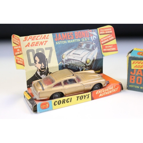 1410 - Boxed Corgi 261 James Bond Aston Martin DB5 diecast model with 2 x ejector figures and secret instru... 