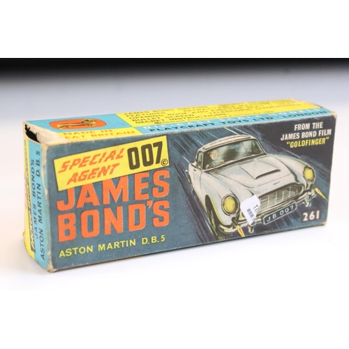 1410 - Boxed Corgi 261 James Bond Aston Martin DB5 diecast model with 2 x ejector figures and secret instru... 