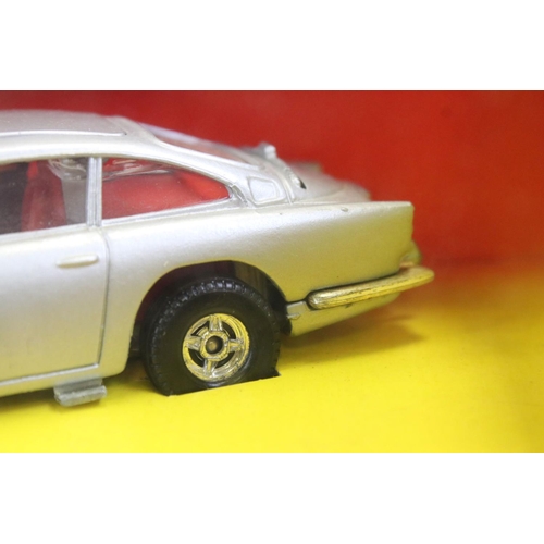 1412 - Boxed Corgi 271 James Bond 007 Aston Martin diecast model, diecast excellent with 2 x ejector figure... 