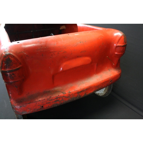 231 - Sharna Triang metal pedal car in red with white grill and hubs, mid 20th C, shows rusting