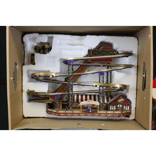 315 - Four Gold Label fairground models to include Roller Coaster, Ferris Wheel, Bump and Go Racers and Ca... 