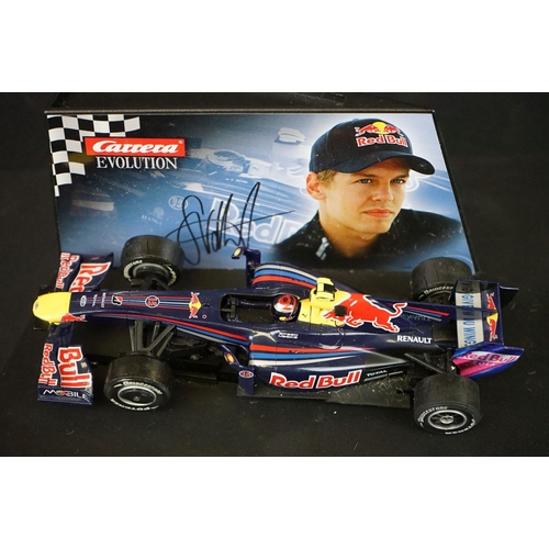 1283A - Two cased slot cars to include Scalextric C2865 McLaren MP4-21 Lewis Hamilton No.22 and Carrera Evol... 