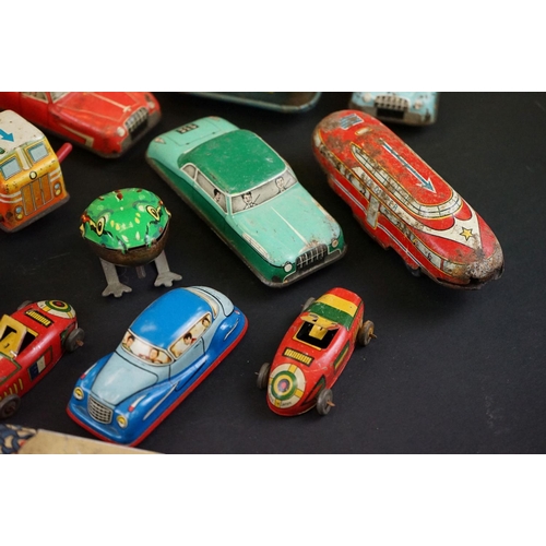 1287 - Over 30 play worn tin plate models, mid 20th C onwards, to include a Modern Toys Space Patrol vehicl... 