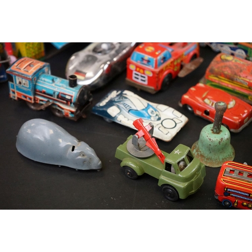 1287 - Over 30 play worn tin plate models, mid 20th C onwards, to include a Modern Toys Space Patrol vehicl... 