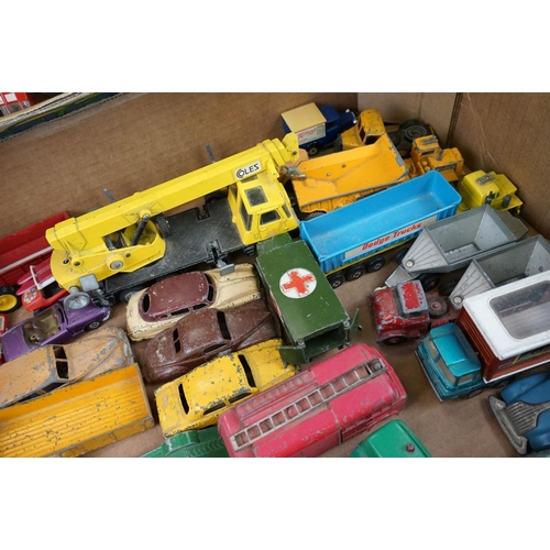 1292 - Around 50 mostly mid 20th C play worn diecast models to include Dinky, Corgi and Crescent Toys, feat... 