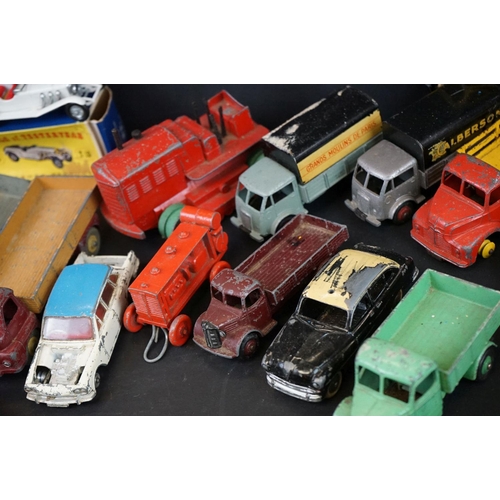 1293 - Over 40 mid 20th C play worn Dinky diecast models to include Observation Coach, Goods Yard Crane, 24... 