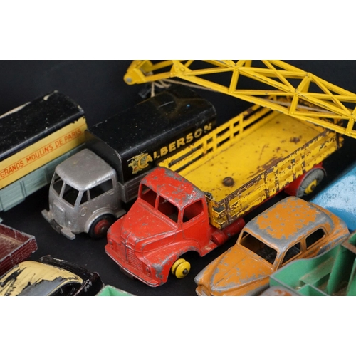 1293 - Over 40 mid 20th C play worn Dinky diecast models to include Observation Coach, Goods Yard Crane, 24... 