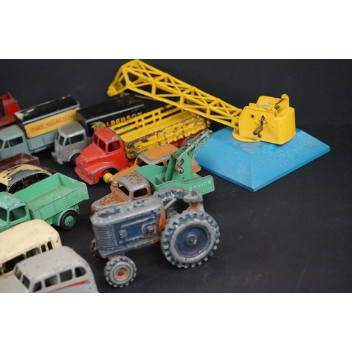 1293 - Over 40 mid 20th C play worn Dinky diecast models to include Observation Coach, Goods Yard Crane, 24... 