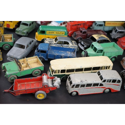 1293 - Over 40 mid 20th C play worn Dinky diecast models to include Observation Coach, Goods Yard Crane, 24... 