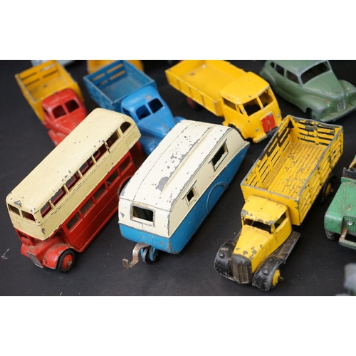 1293 - Over 40 mid 20th C play worn Dinky diecast models to include Observation Coach, Goods Yard Crane, 24... 