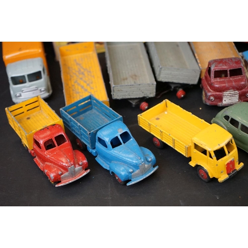 1293 - Over 40 mid 20th C play worn Dinky diecast models to include Observation Coach, Goods Yard Crane, 24... 