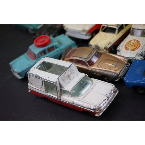 1293A - Over 40 mid 20th C play worn diecast models to include Dinky, Corgi, Matchbox, Britains and Budgie e... 