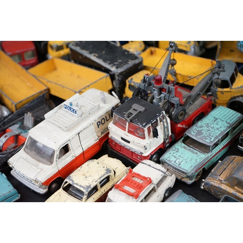 1293A - Over 40 mid 20th C play worn diecast models to include Dinky, Corgi, Matchbox, Britains and Budgie e... 