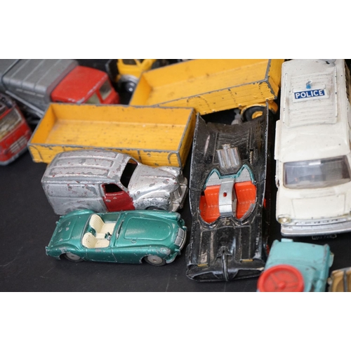 1293A - Over 40 mid 20th C play worn diecast models to include Dinky, Corgi, Matchbox, Britains and Budgie e... 