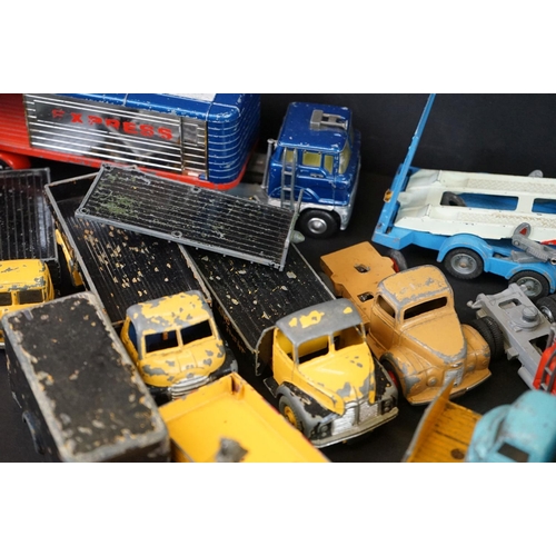 1293A - Over 40 mid 20th C play worn diecast models to include Dinky, Corgi, Matchbox, Britains and Budgie e... 