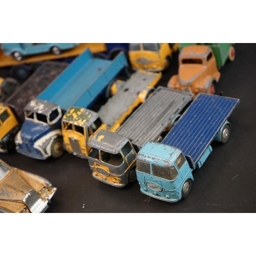 1293A - Over 40 mid 20th C play worn diecast models to include Dinky, Corgi, Matchbox, Britains and Budgie e... 