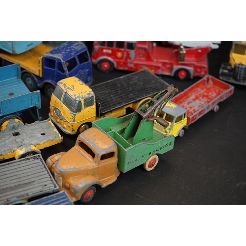 1293A - Over 40 mid 20th C play worn diecast models to include Dinky, Corgi, Matchbox, Britains and Budgie e... 