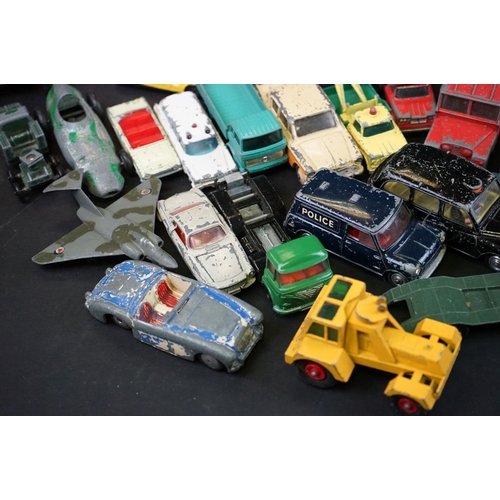 1293B - Around 65 mostly mid 20th C play worn diecast models to include Dinky, Corgi, Budgie and Matchbox ex... 