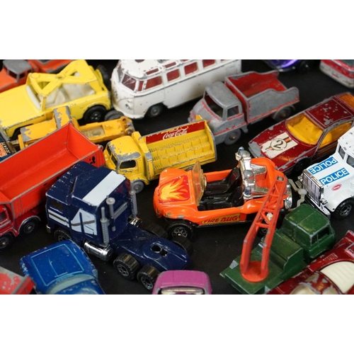 1293B - Around 65 mostly mid 20th C play worn diecast models to include Dinky, Corgi, Budgie and Matchbox ex... 