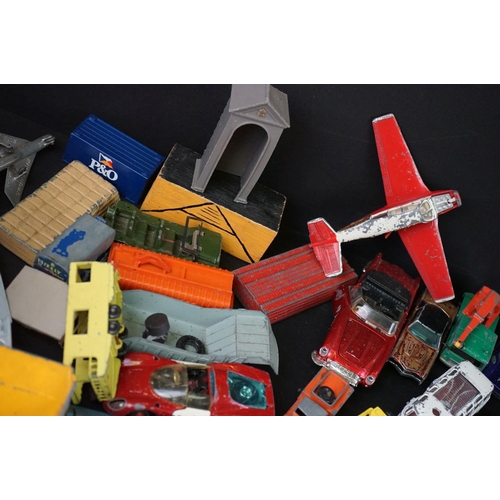 1293B - Around 65 mostly mid 20th C play worn diecast models to include Dinky, Corgi, Budgie and Matchbox ex... 