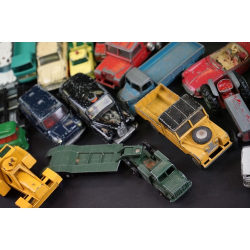 1293B - Around 65 mostly mid 20th C play worn diecast models to include Dinky, Corgi, Budgie and Matchbox ex... 