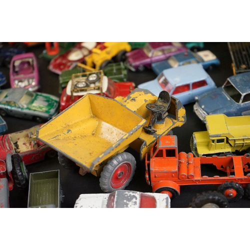 1293B - Around 65 mostly mid 20th C play worn diecast models to include Dinky, Corgi, Budgie and Matchbox ex... 