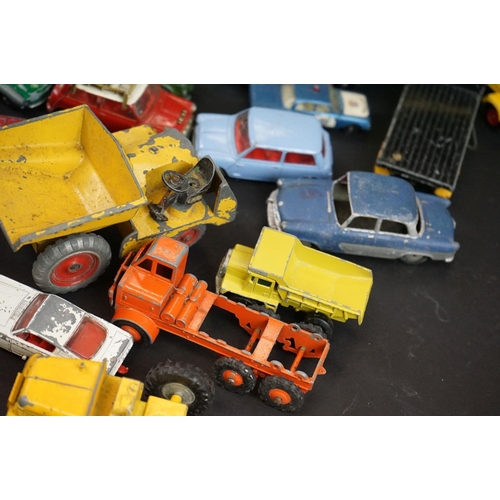 1293B - Around 65 mostly mid 20th C play worn diecast models to include Dinky, Corgi, Budgie and Matchbox ex... 