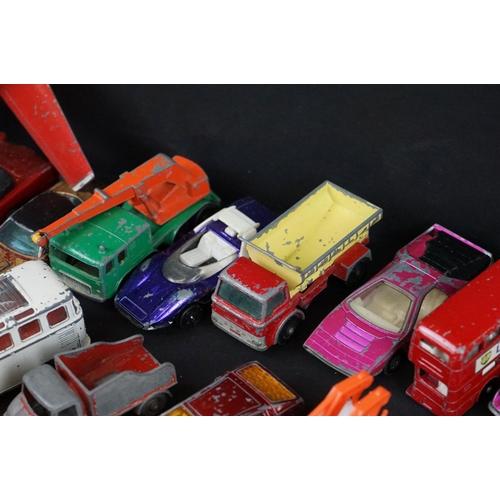 1293B - Around 65 mostly mid 20th C play worn diecast models to include Dinky, Corgi, Budgie and Matchbox ex... 