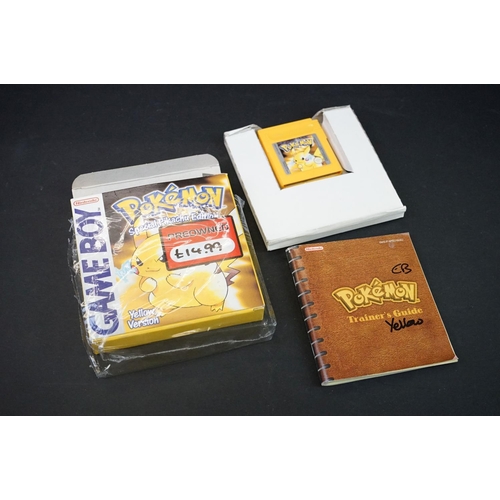 388 - Retro Gaming - Four Pokemon Games to include boxed Nintendo Gameboy Yellow Version (with instruction... 