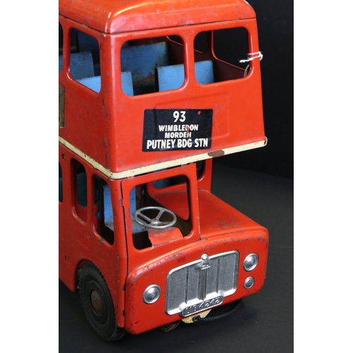 289 - Original Triang tin plate London Transport Routemaster bus with 'Putney Bridge Station' decals, show... 