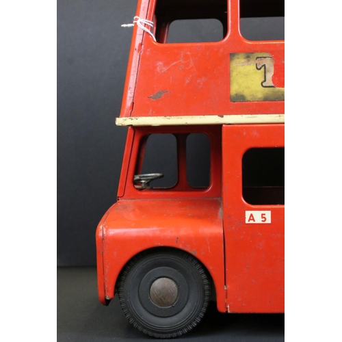 289 - Original Triang tin plate London Transport Routemaster bus with 'Putney Bridge Station' decals, show... 