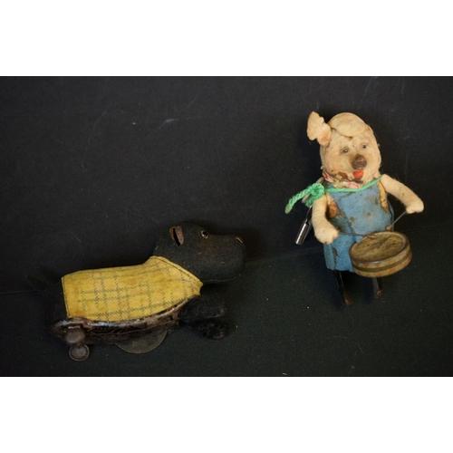 272A - Group of mixed toys to include 3 x vintage tin plate clockwork animals featuring Schuco dog, all sho... 