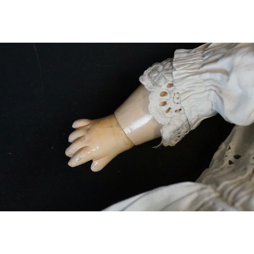 404 - Early 20th C Heubach Koppelsdorf doll with sleeping blue eyes, teeth and original outfit featuring r... 