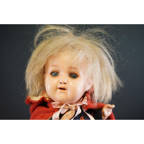 404 - Early 20th C Heubach Koppelsdorf doll with sleeping blue eyes, teeth and original outfit featuring r... 