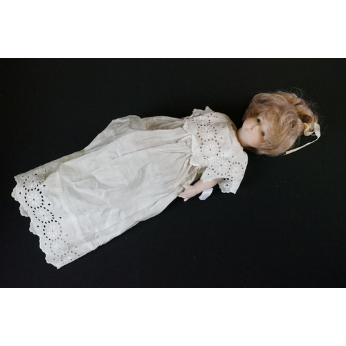 404 - Early 20th C Heubach Koppelsdorf doll with sleeping blue eyes, teeth and original outfit featuring r... 