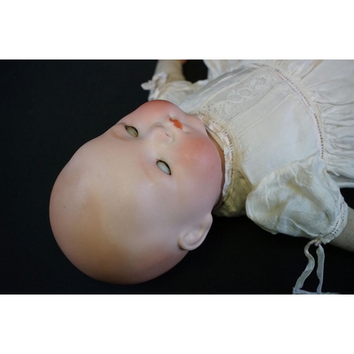 408 - Four early 20th C dolls, mainly babies to include Armand Marseille sleeping blue glass eyes, Kopples... 